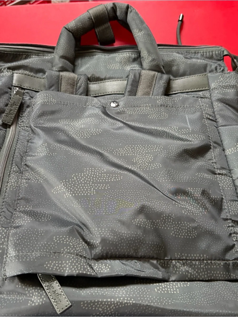Itzy Ritzy green/grey camo Dream Diaper Backpack